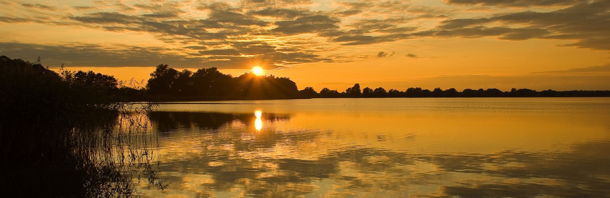 Goldener Sonnenuntergang am Mechower See., © Thomas Ebelt / HLMS GmbH